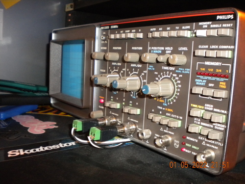 oscilloscope at night with flash